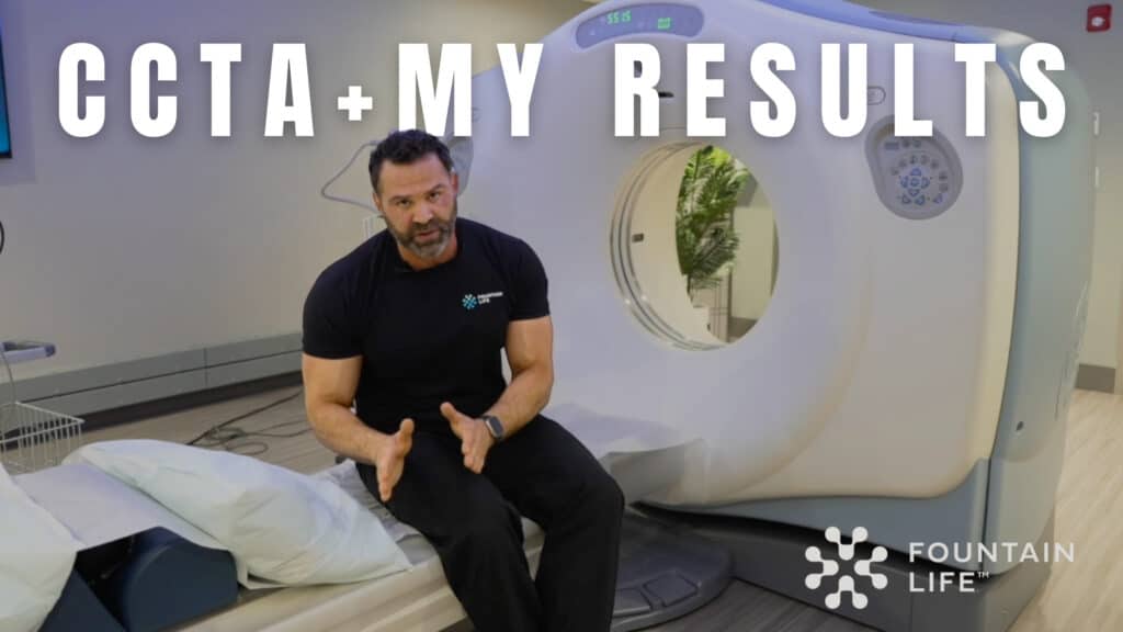 A man in a black shirt sits on the edge of a CT scanner in a medical room, highlighting the link between advanced health insights and fitness. Large text reads "CCTA + MY RESULTS." Fountain Life logo is visible in the lower right corner.