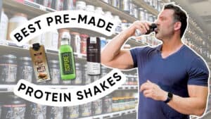 A man drinks a protein shake in a store aisle with shelves of protein products; text reads "Best Pre-Made Protein Shakes." Perfect for a post-workout boost or recommended by your online fitness coach, with images of various protein shake bottles.